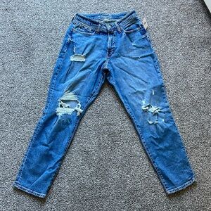 Women’s ripped high rise jeans